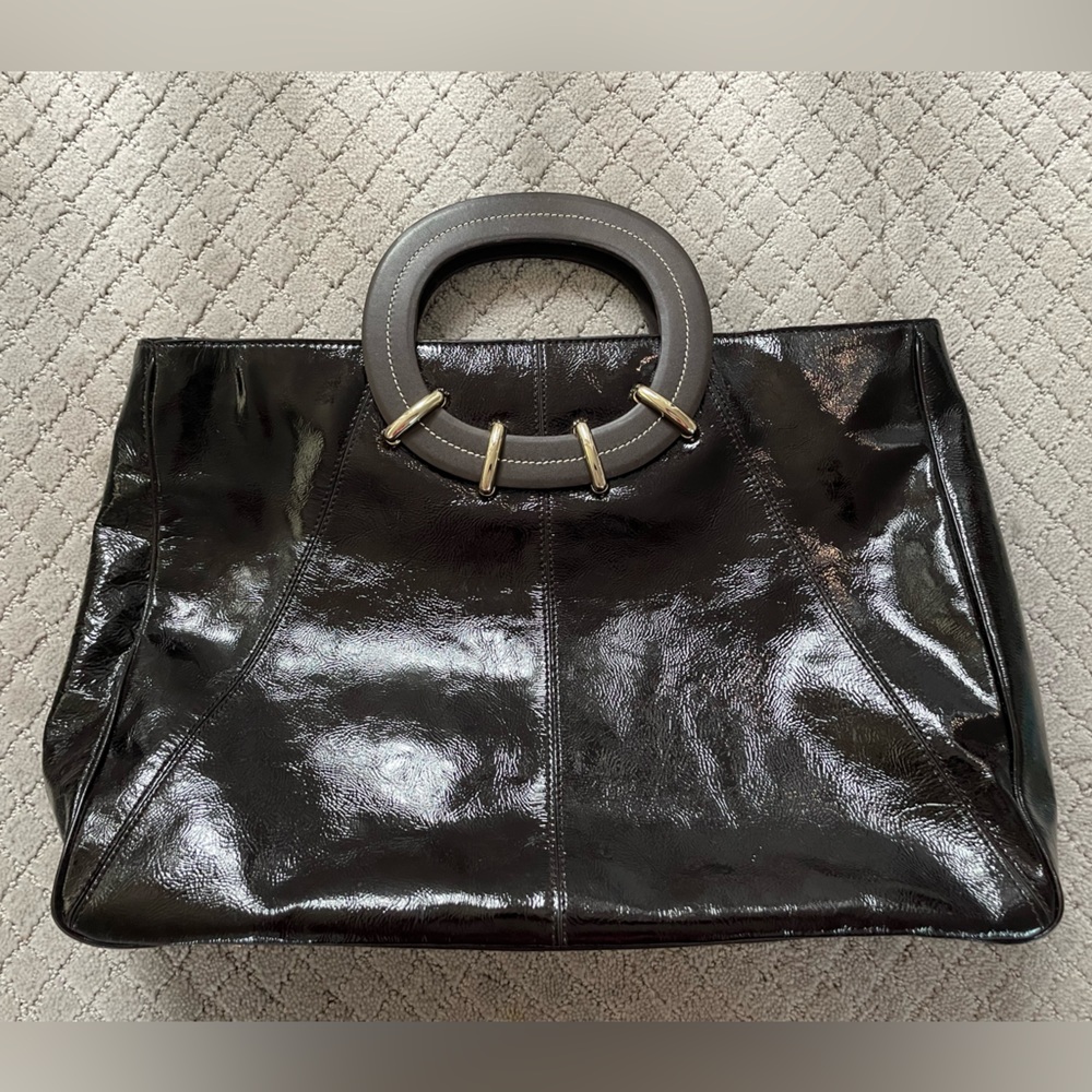 Beautiful Kate Spade purse.  Never used. 15.5” long x 11.5” tall x 4” deep.